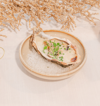 Gegratineerde oester met champagnesaus  